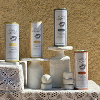 The complete Soma Grove olive oil set, featuring Classic, Garlic, Lemon, & Orange for ultimate recipe and flavor versatility.